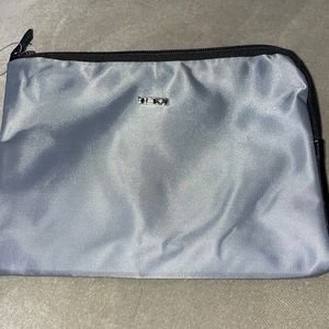 Tumi zippered pouch NEW first class travel